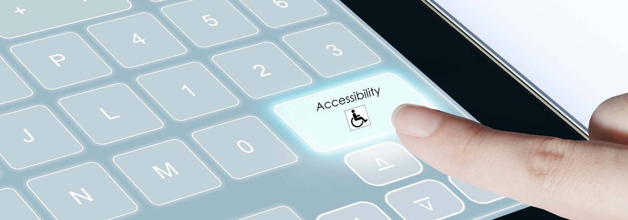 finger pointing to digital accessibility button