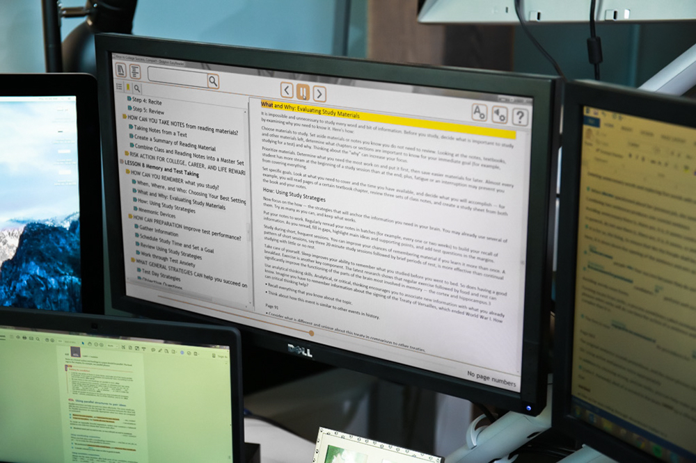 A computer monitor showing Etext.