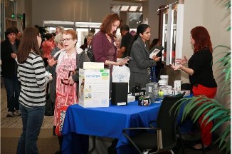 An Assistive Technology table at an event.